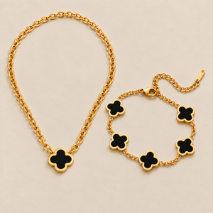 Conjunto de trébol negro sobre fondo crema