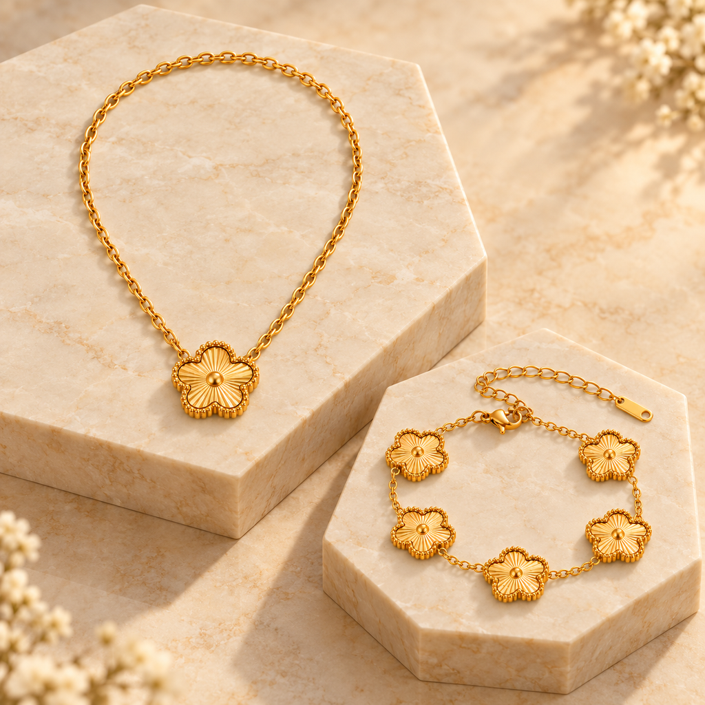 Golden Clover Necklace & Bracelet Set — editorial photograph