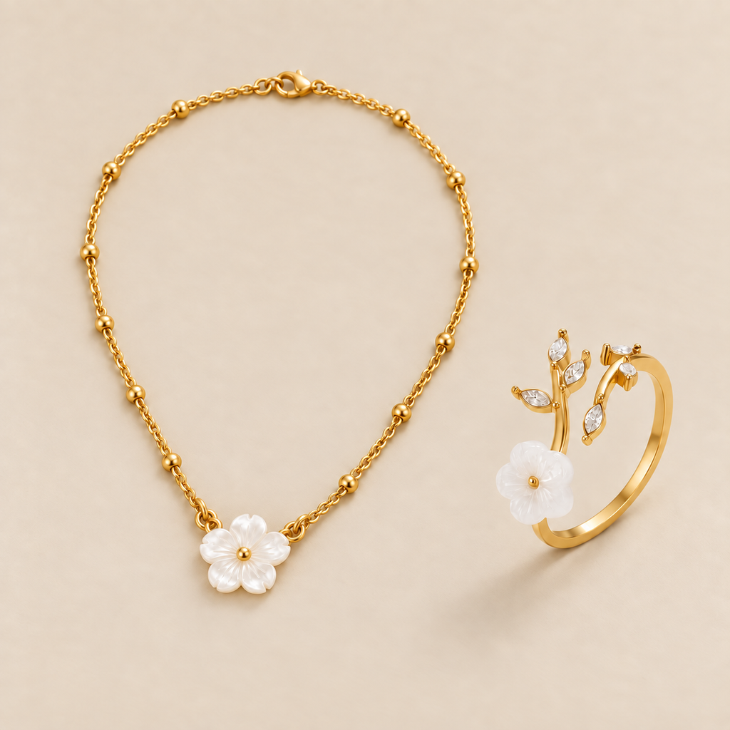Conjunto de flor blanca dorada sobre fondo crema