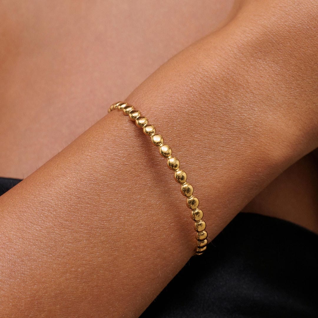 Elegante Pulsera de Puño con Cuentas