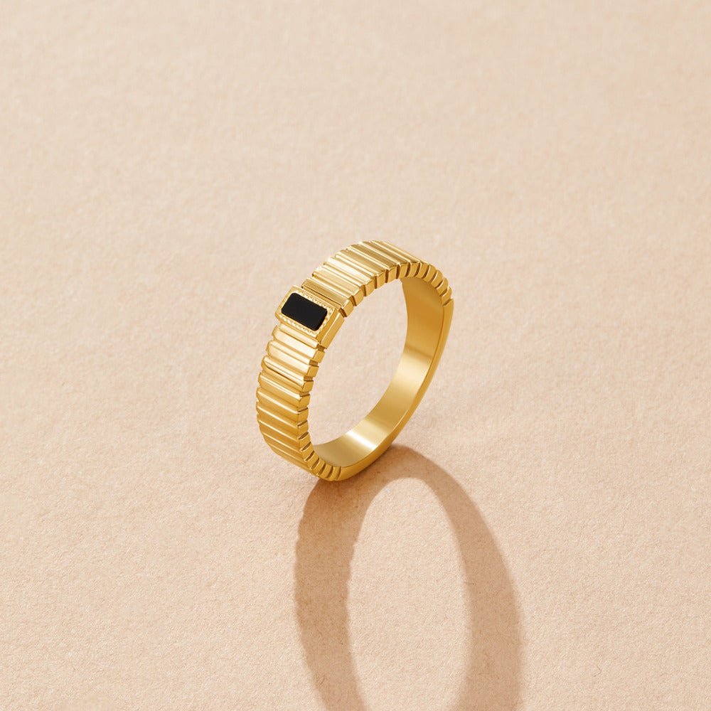 Anillo acanalado de cristal negro