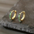 Pendientes de gota dorados inspirados en la costa