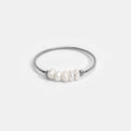 Anillo clásico de plata con perla de agua dulce