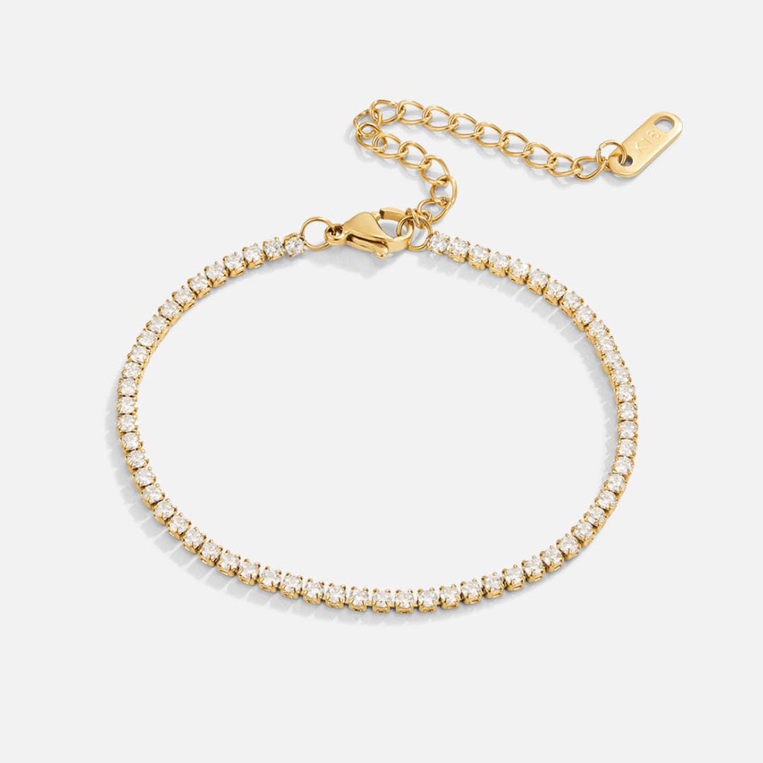 Pulsera de tenis de oro atemporal