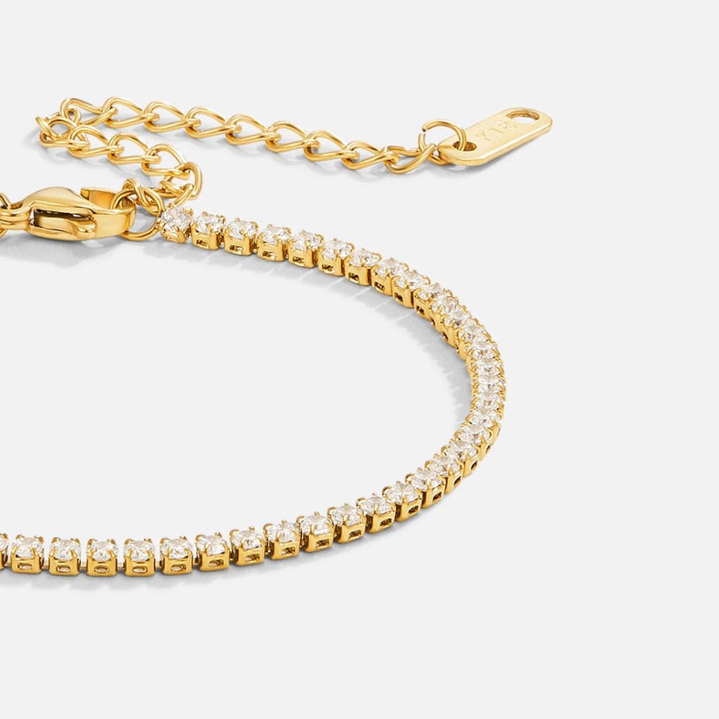 Pulsera de tenis de oro atemporal