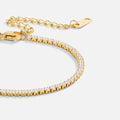 Pulsera de tenis de oro atemporal