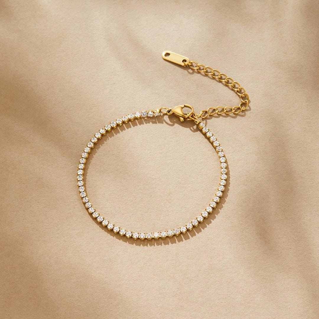 Pulsera de tenis de oro atemporal