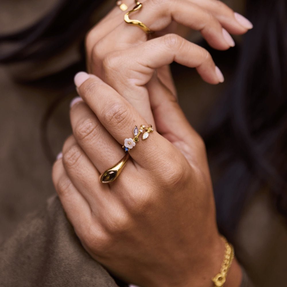 Anillo Crystal White Blossom Oro