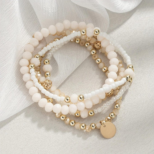 Pulsera con abalorios de crema costera
