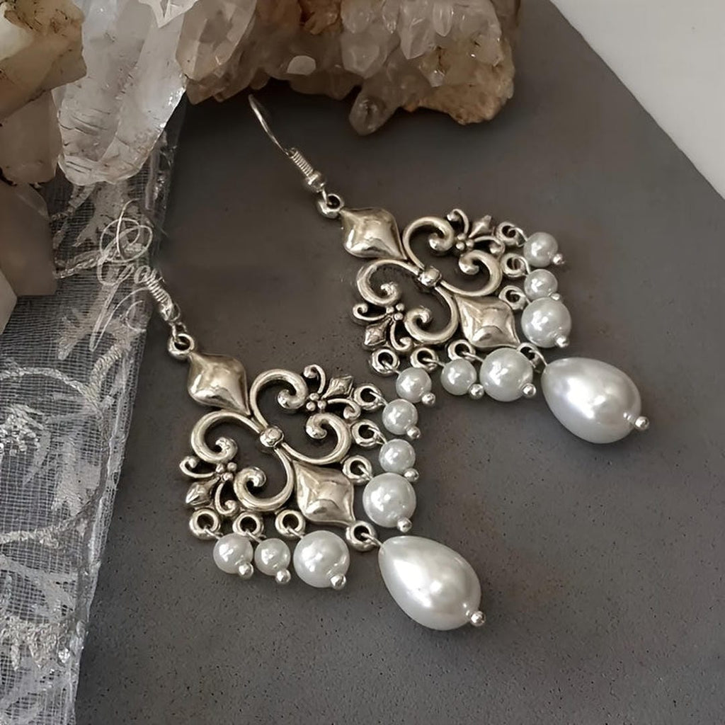 Pendientes largos de filigrana con perlas y araña