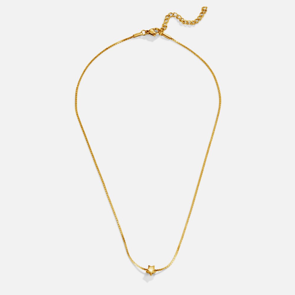 Collar de oro con dije de estrella delicada