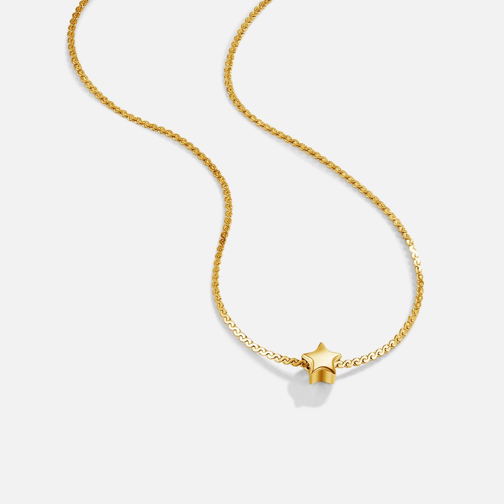 Collar de oro con dije de estrella delicada