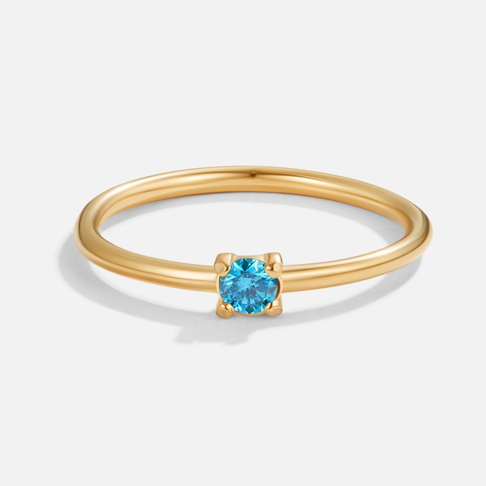 Anillo de oro de 18K con piedra natal de diciembre