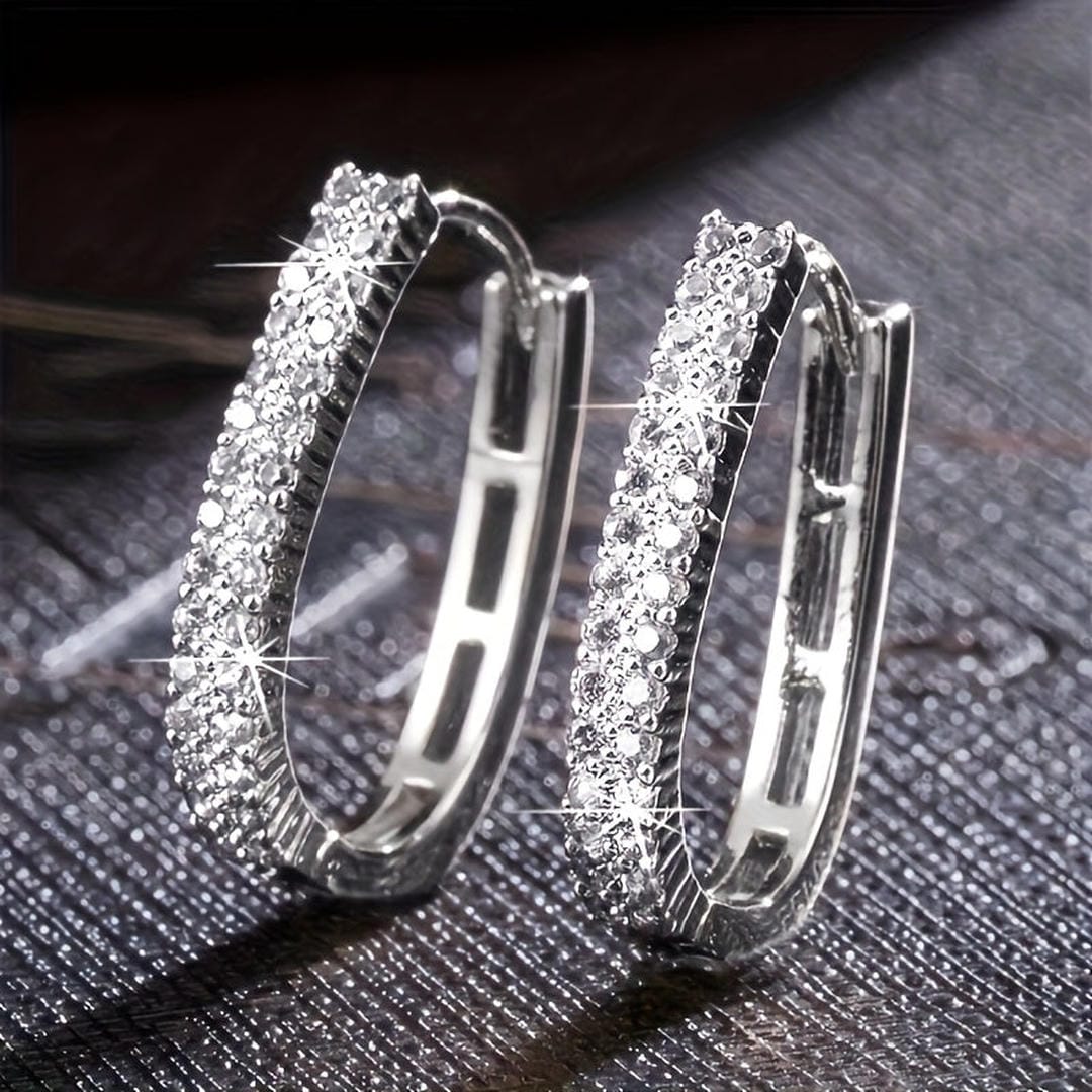 Pendientes circulares elegantes de circonita