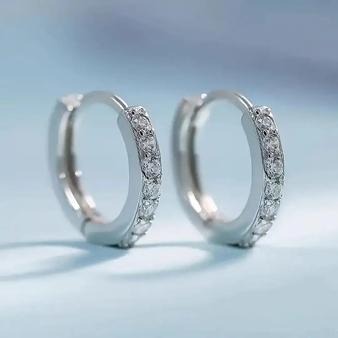 Pendientes de gota dorados inspirados en la costa