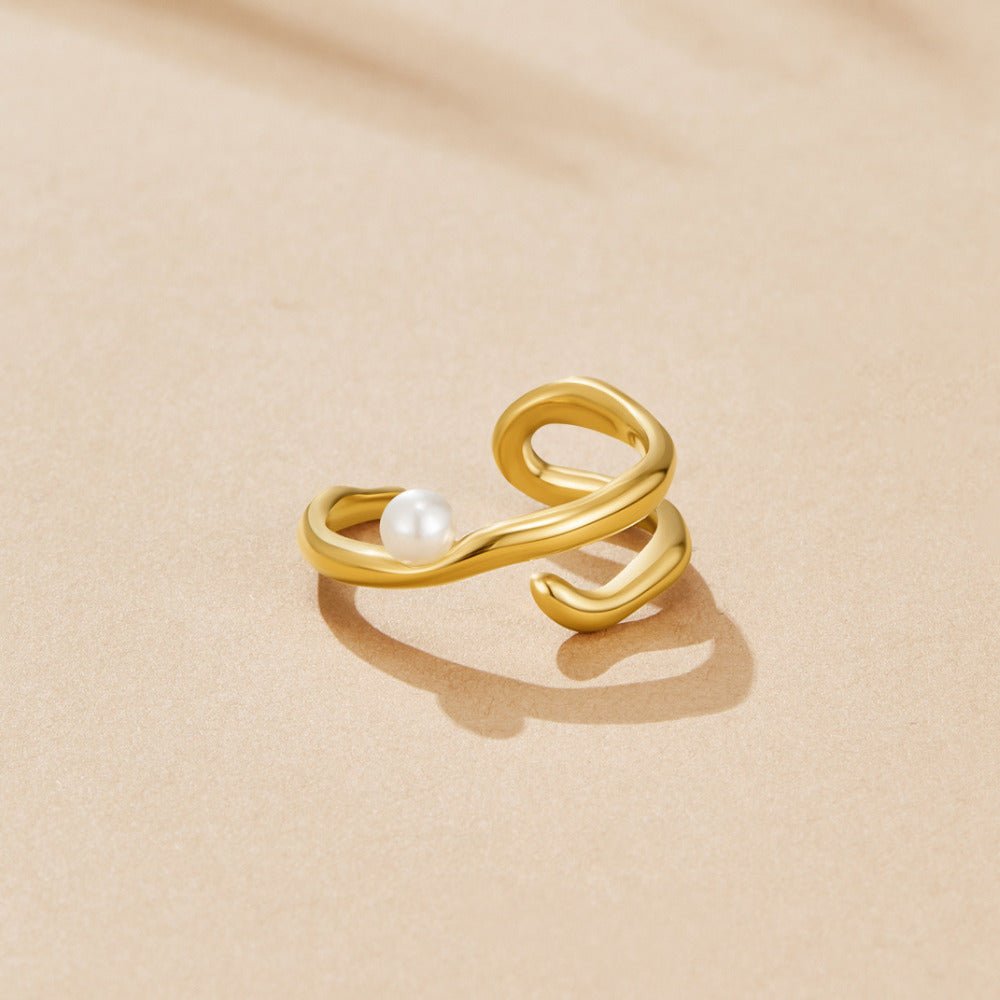 Anillo geométrico de oro y perlas