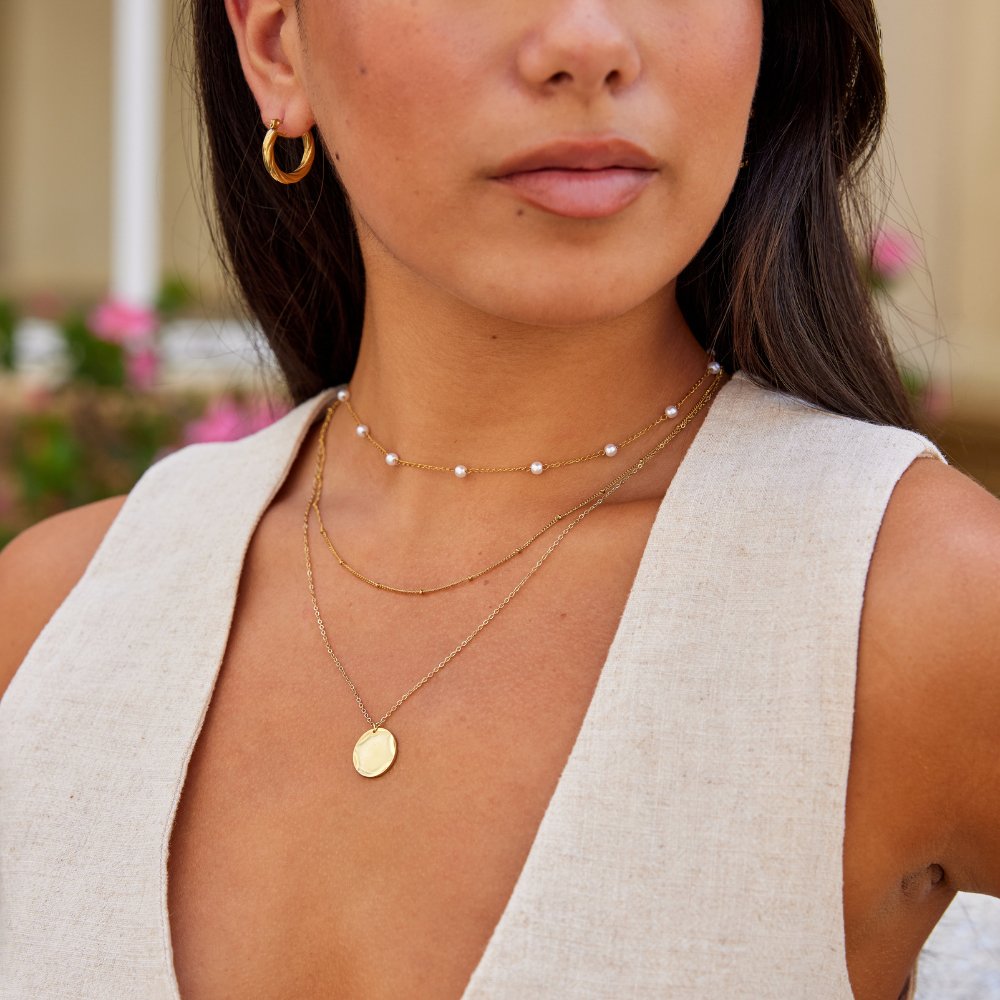 Collar de moneda de oro