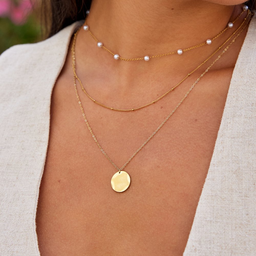 Collar de moneda de oro