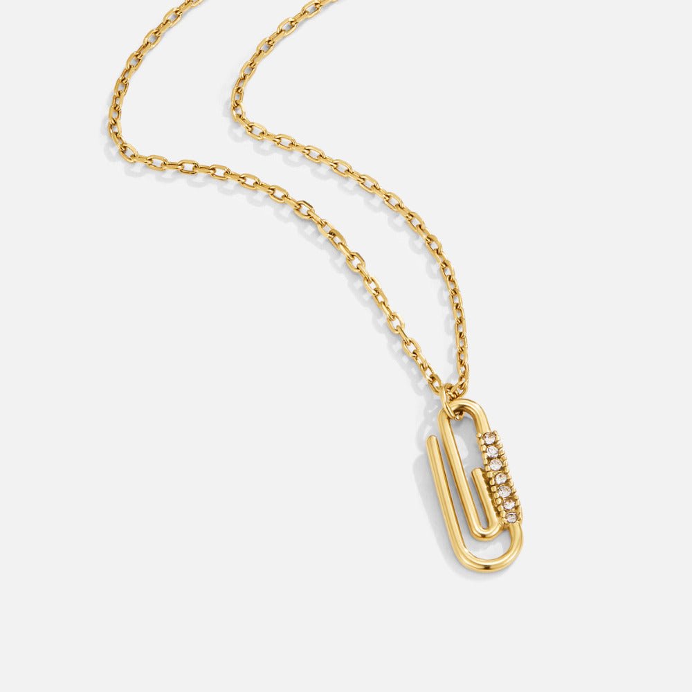 Collar con colgante de clip de cristal dorado
