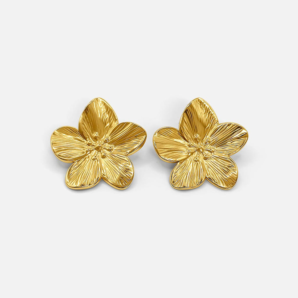 Elegantes aretes florales dorados