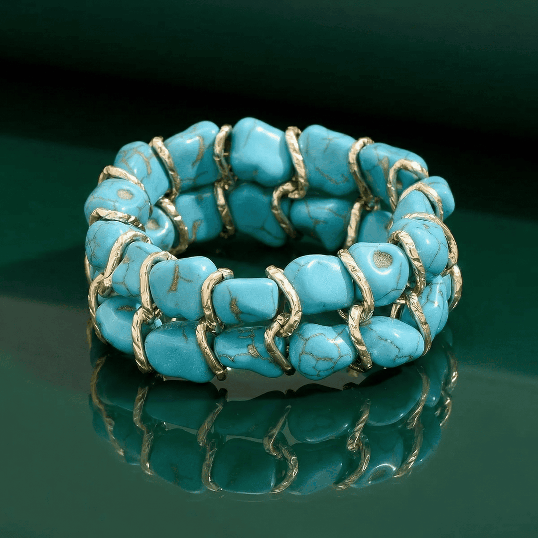 Pulsera de oro tejida con piedra turquesa