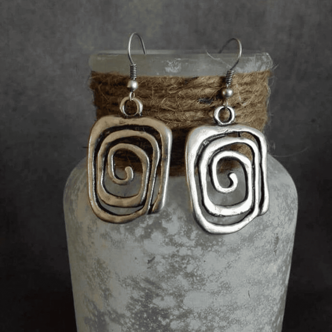 Pendientes en espiral de plata vintage