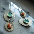 Clásicos aretes de plata con diseño vintage natural