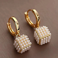 Pendientes cúbicos elegantes con perlas
