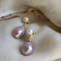 Elegantes pendientes de perlas lilas