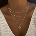 Juego de collar con colgante de estrella atemporal