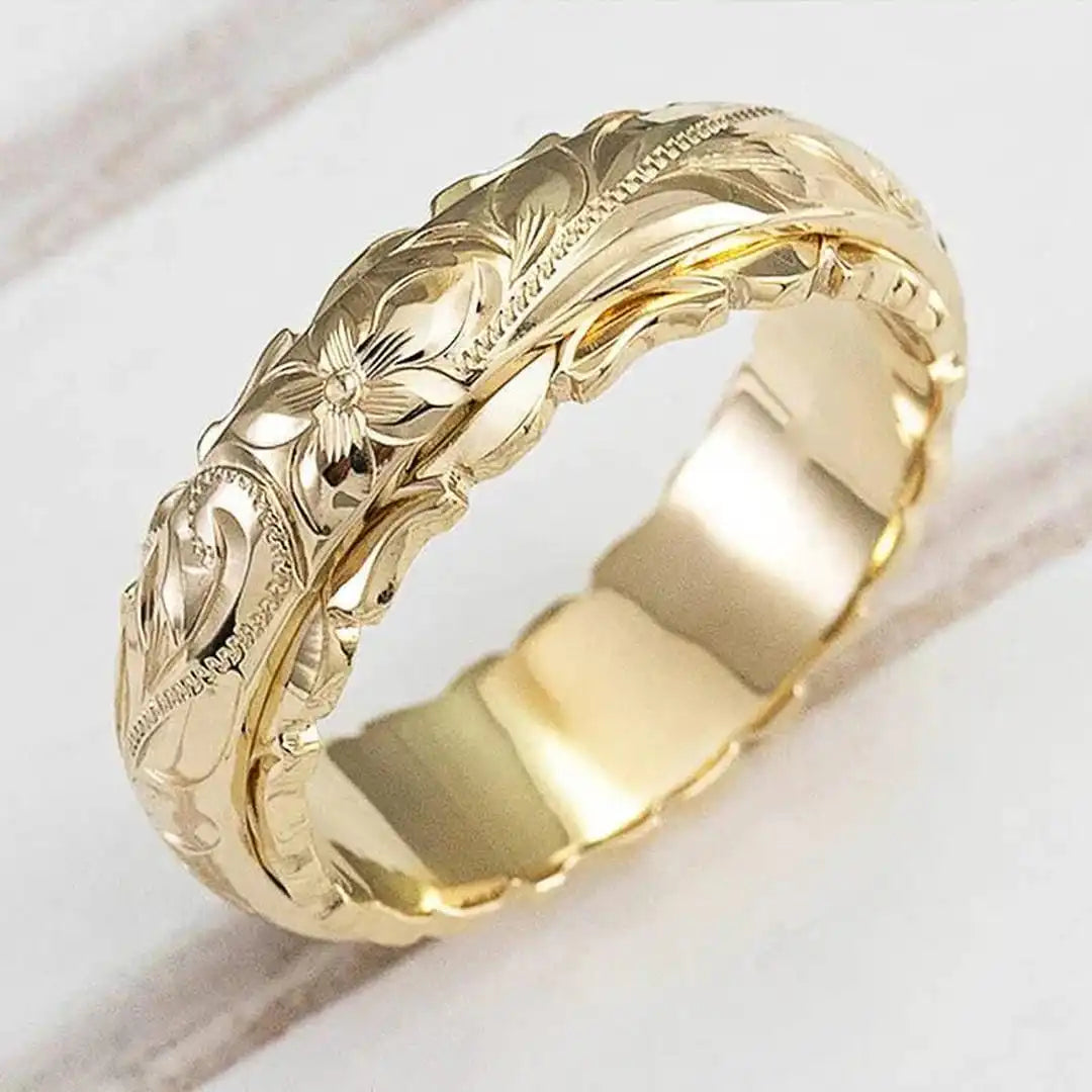 Anillo de oro antiguo con flor