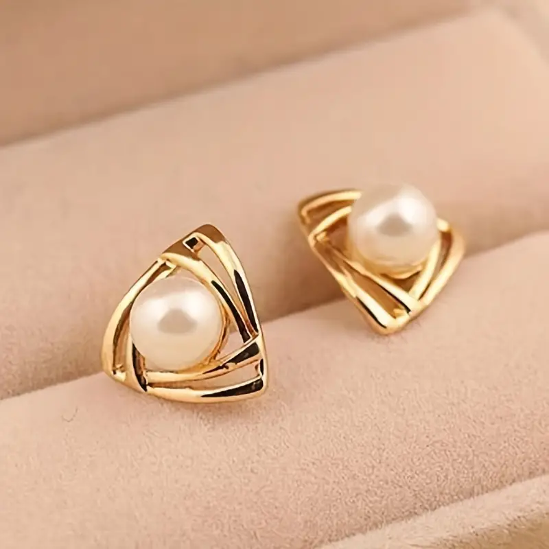 Pendientes clásicos de perlas y oro
