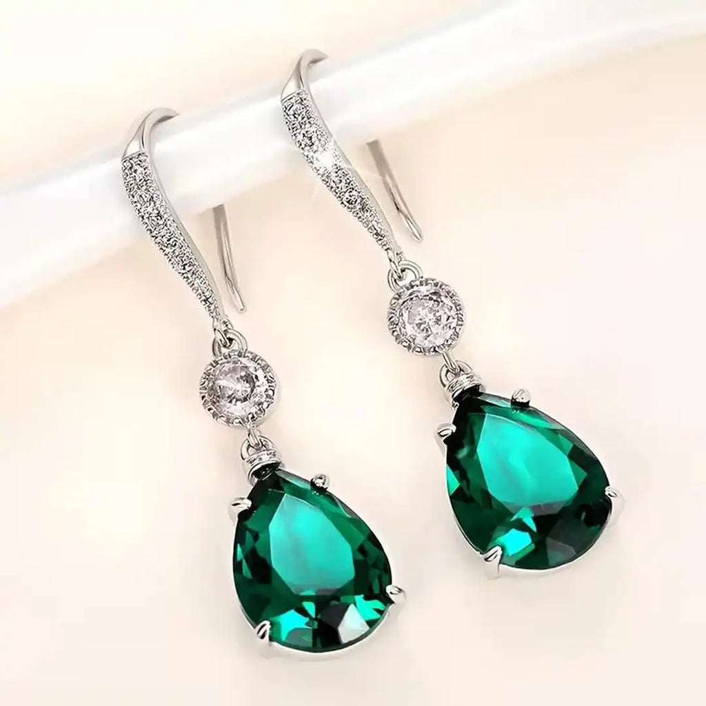 Pendientes elegantes de lágrima de esmeralda
