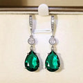 Pendientes elegantes de lágrima de esmeralda