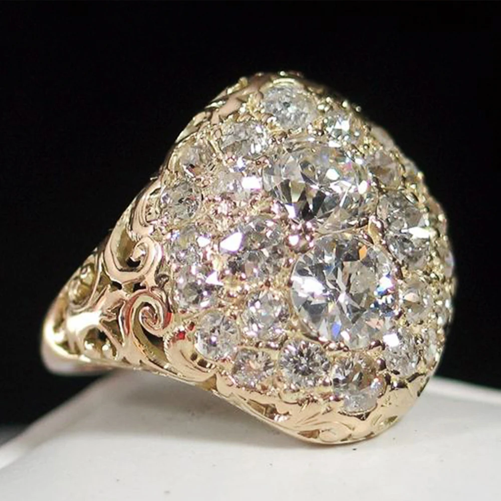 Anillo vintage de oro con cristales redondos