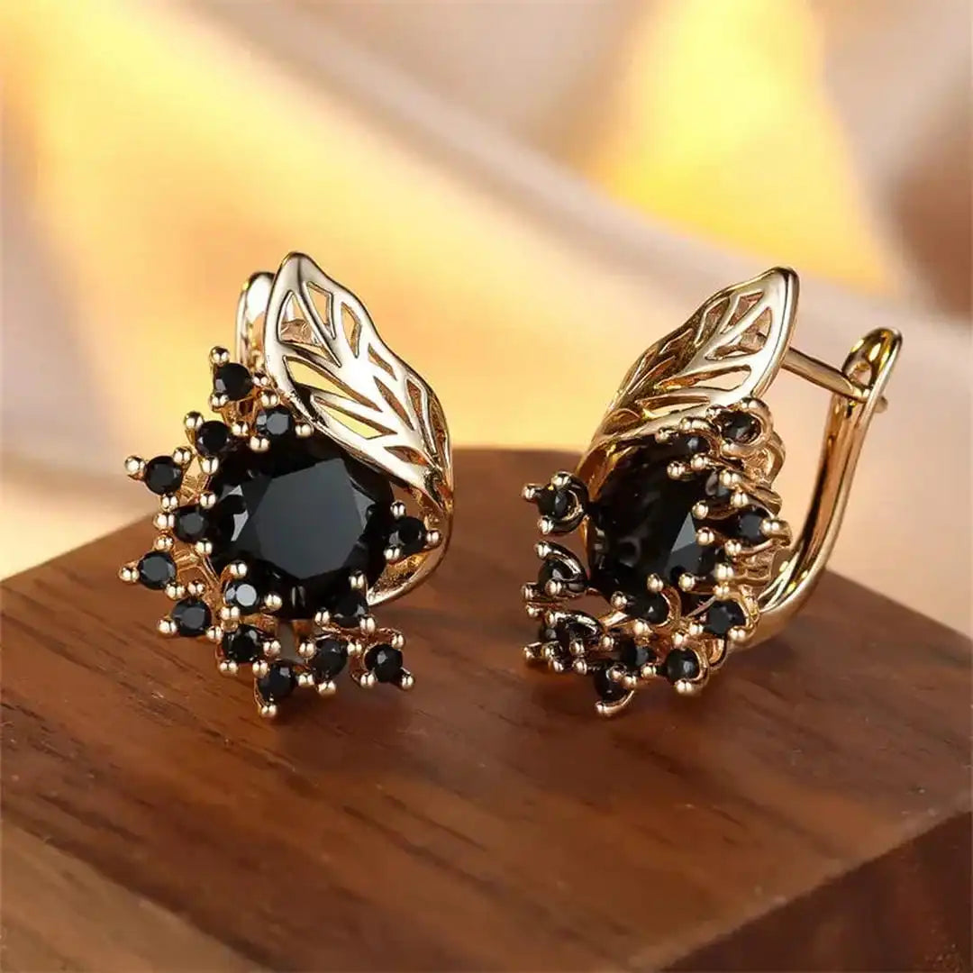 Pendientes dorados de circonita negra
