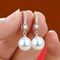 Pendientes colgantes de perlas con circonita brillante