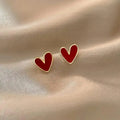 Pendientes de oro de corazón rojo antiguos