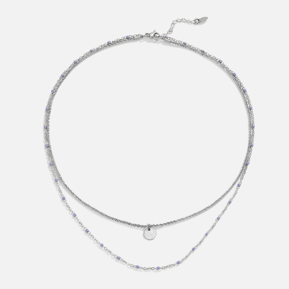 Collar con cuentas y moneda plateada superpuestas Lia