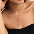 Collar con borla y cuentas doradas Lovi