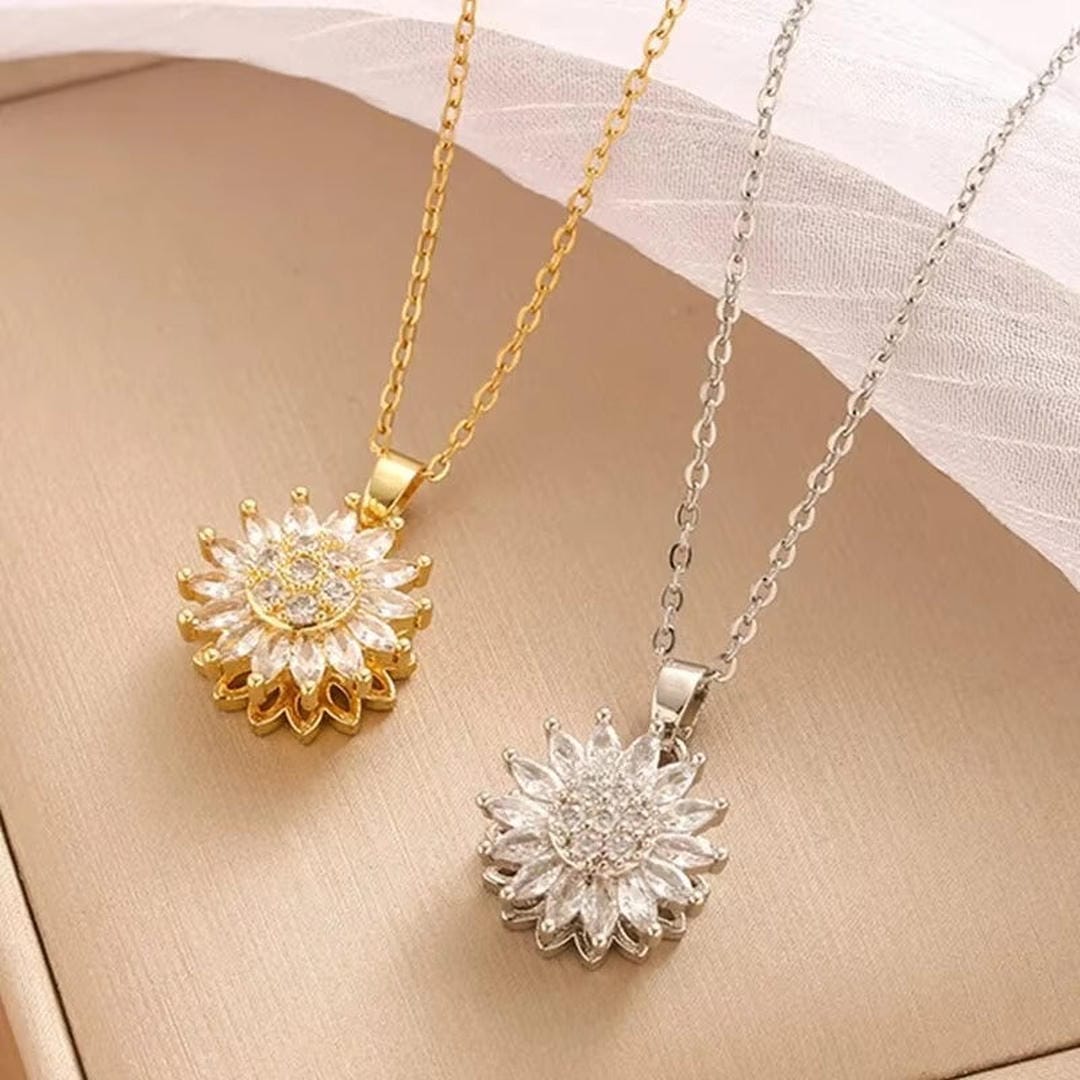 Elegante conjunto de collar y pendientes de circonita de girasol plateado