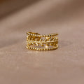 Anillo Marissa chapado en oro con capas de hojas