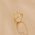 Anillo de corazón de oro derretido
