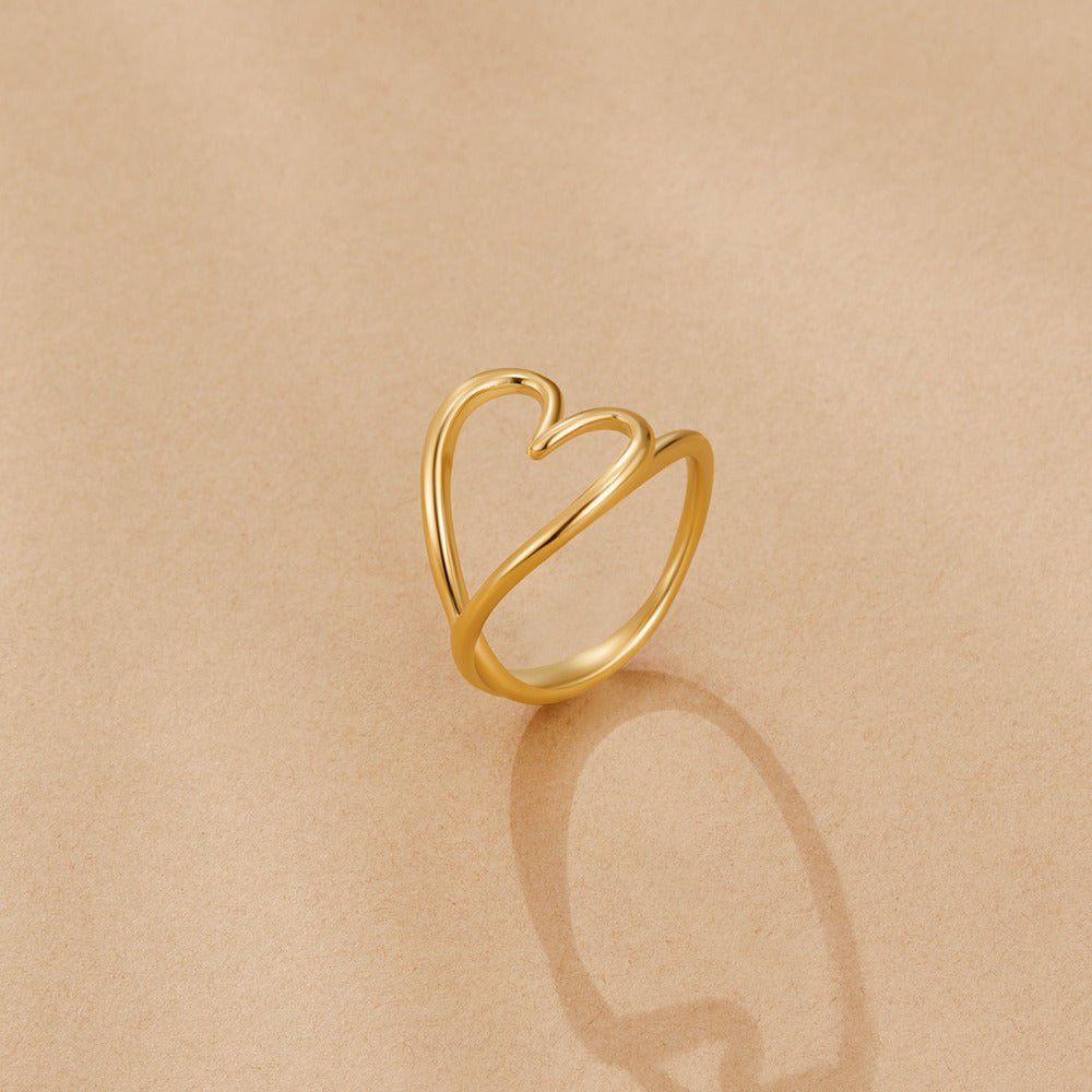 Anillo de corazón de oro derretido