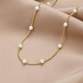 Collar atemporal de perlas de oro