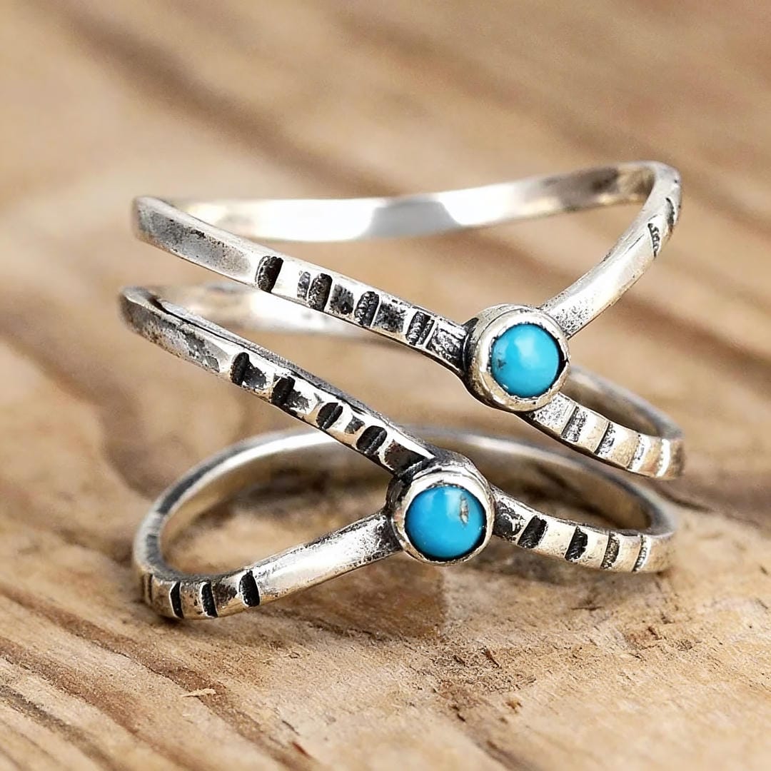 Anillo de cruz con piedra turquesa infinita