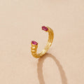 Anillo de puño de cristal rosa