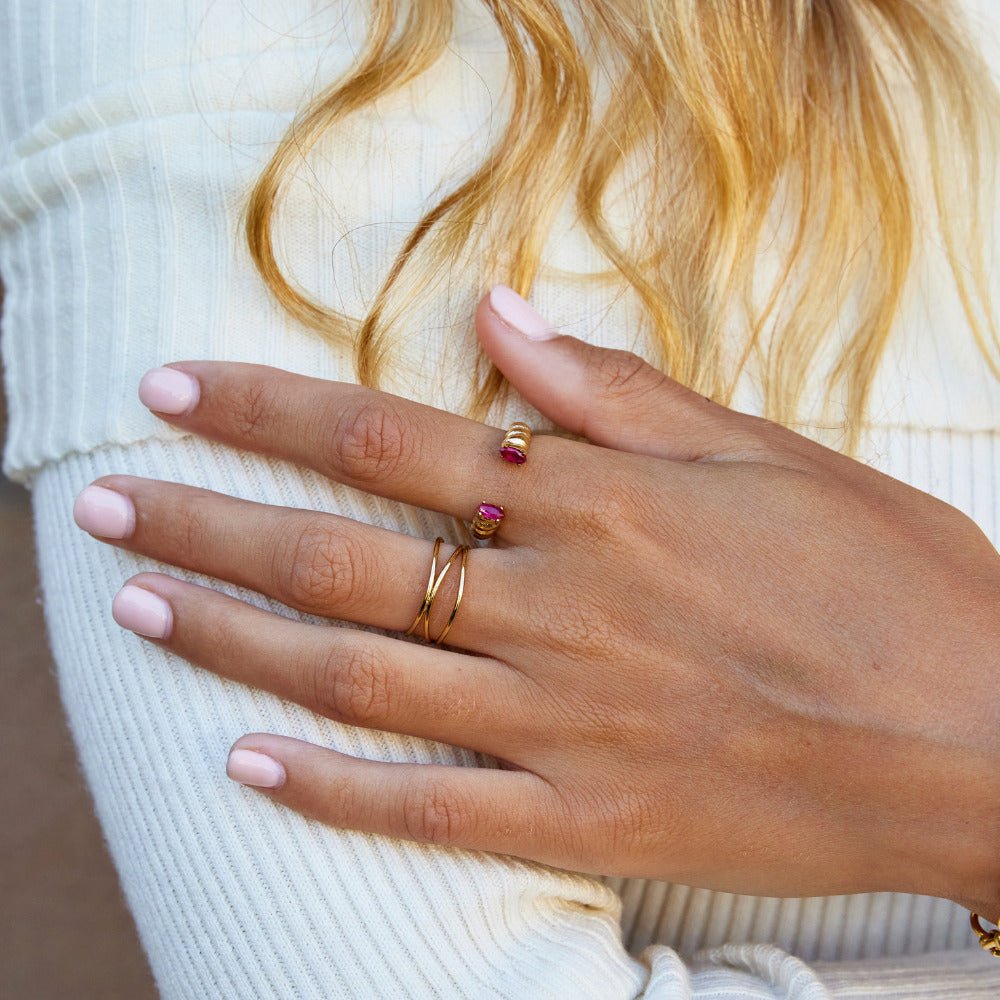 Anillo de puño de cristal rosa