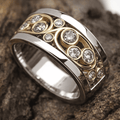 Anillo vintage de circonita con hiedra de oro y plata