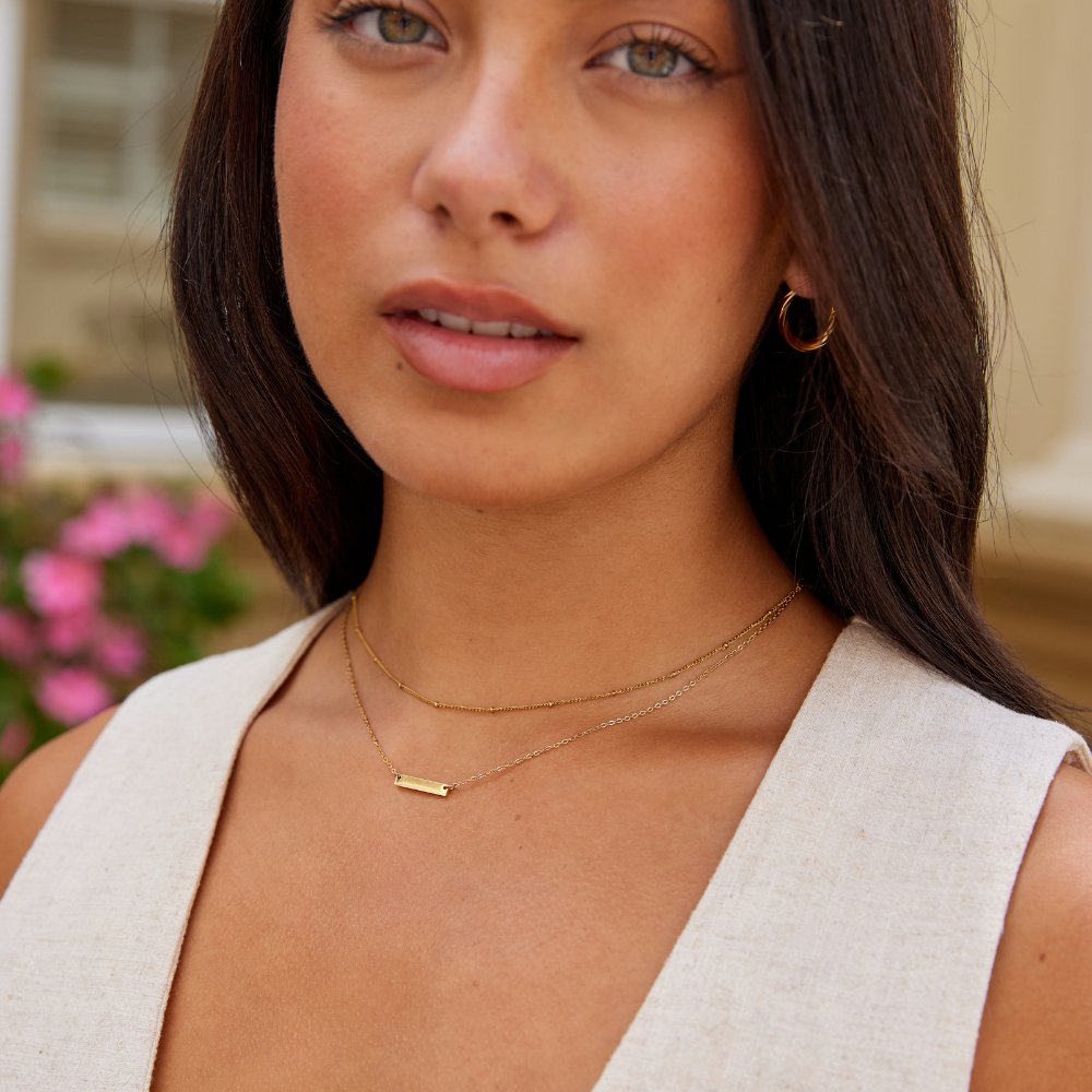 Collar de barra de oro Rina